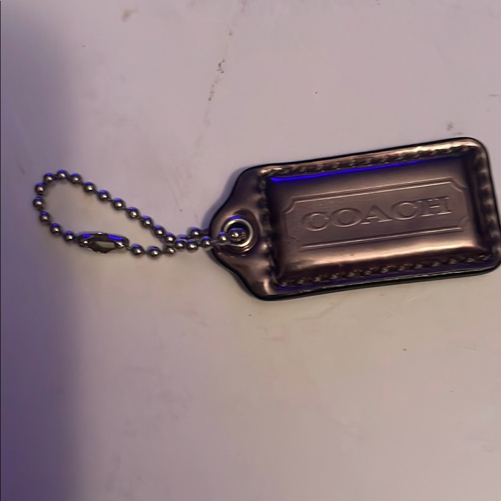Coach metallic looking hang tag
